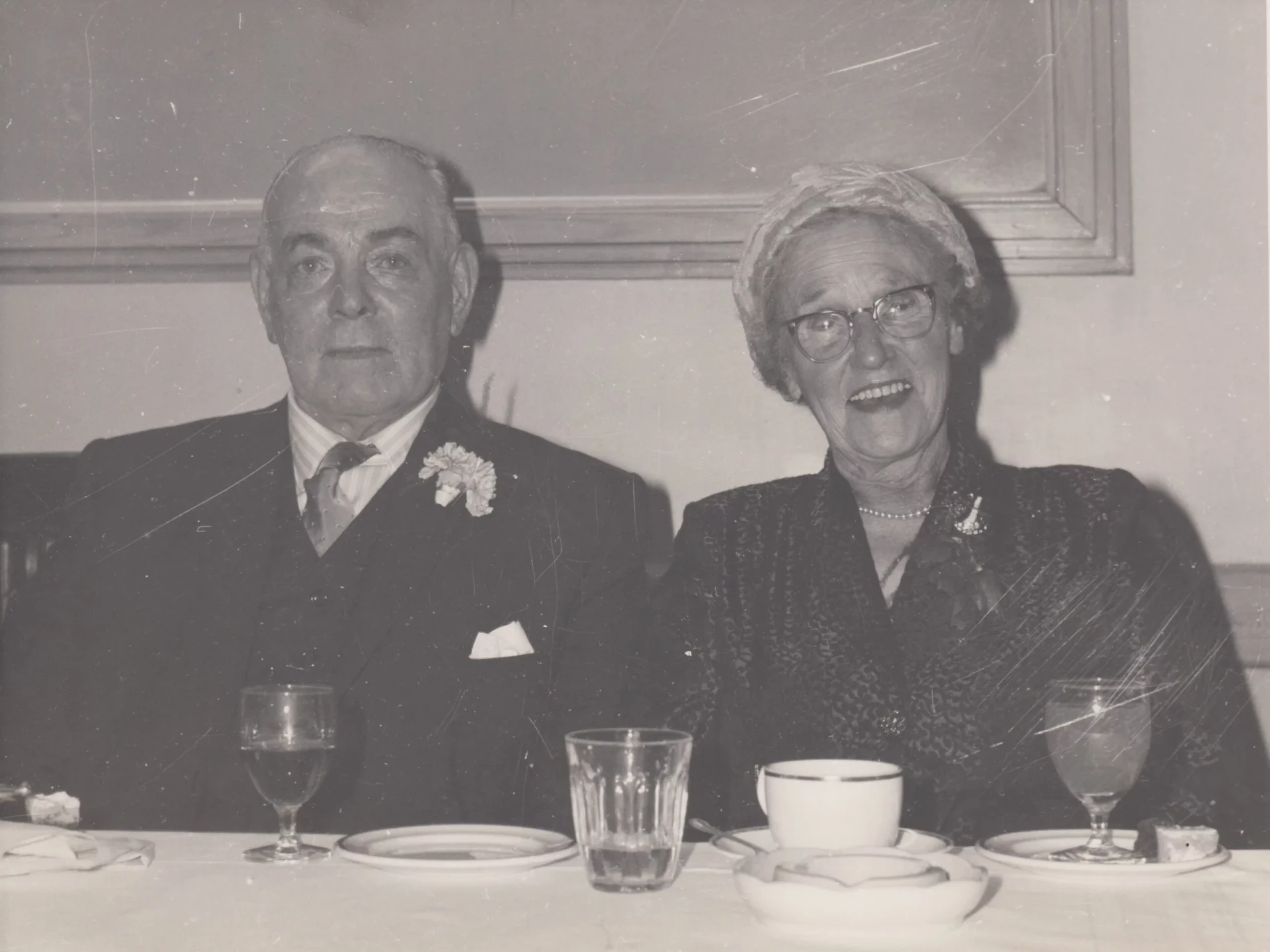 A couple at a formal dinner celebration