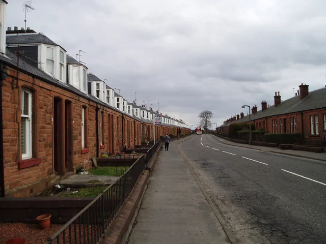 Red Dumfries Sandstone Cottages Historic red Dumfries sandstone cottages of Allandale village built on the Antonine Wall with characteristic Scottish architecture