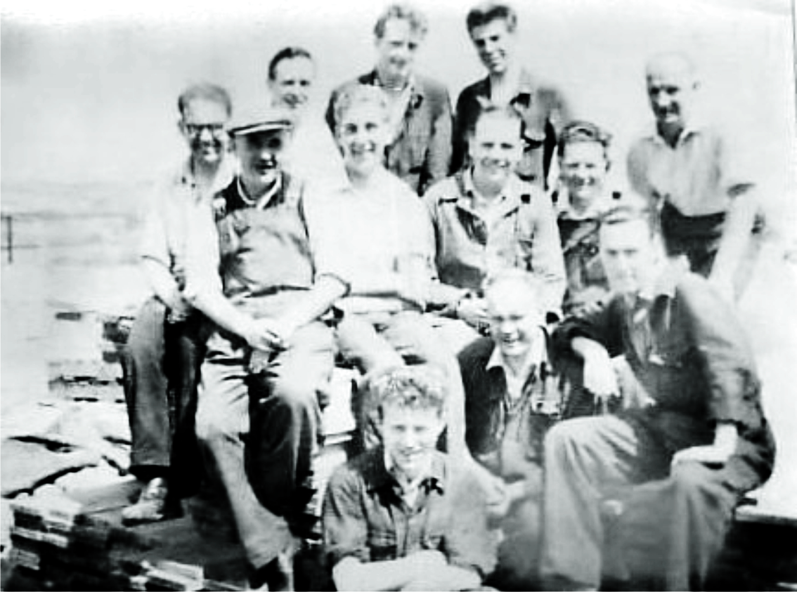Group of patternshop workers gathered for a photograph