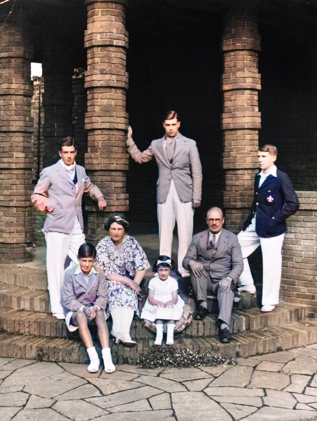 Workers and families at the John G. Stein brickworks, showing the brick kilns in the background