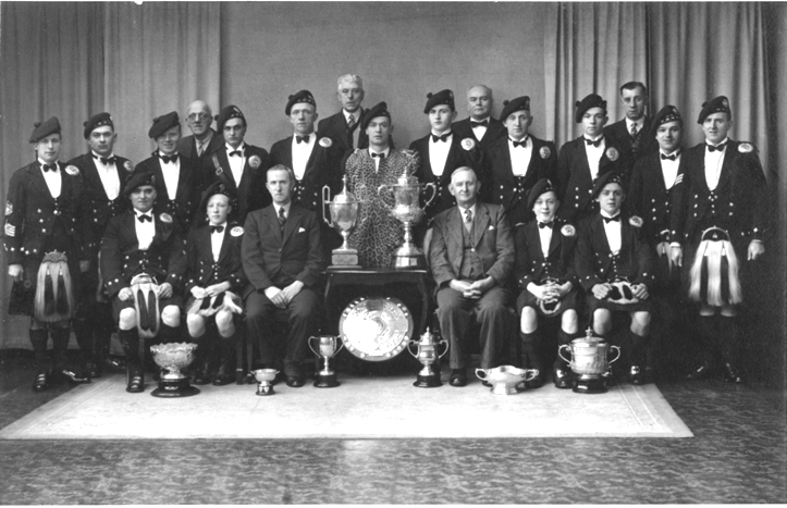 1938 World Championship Victory Allandale Pipe Band 1938 World Championship winners with Lord Inverclyde Shield, Sir Harry Lauder Shield, Crozier Shield and 72 medals at Cowal Games